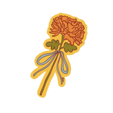 Decorative sticker of a flower with a yellow border on a light beige background